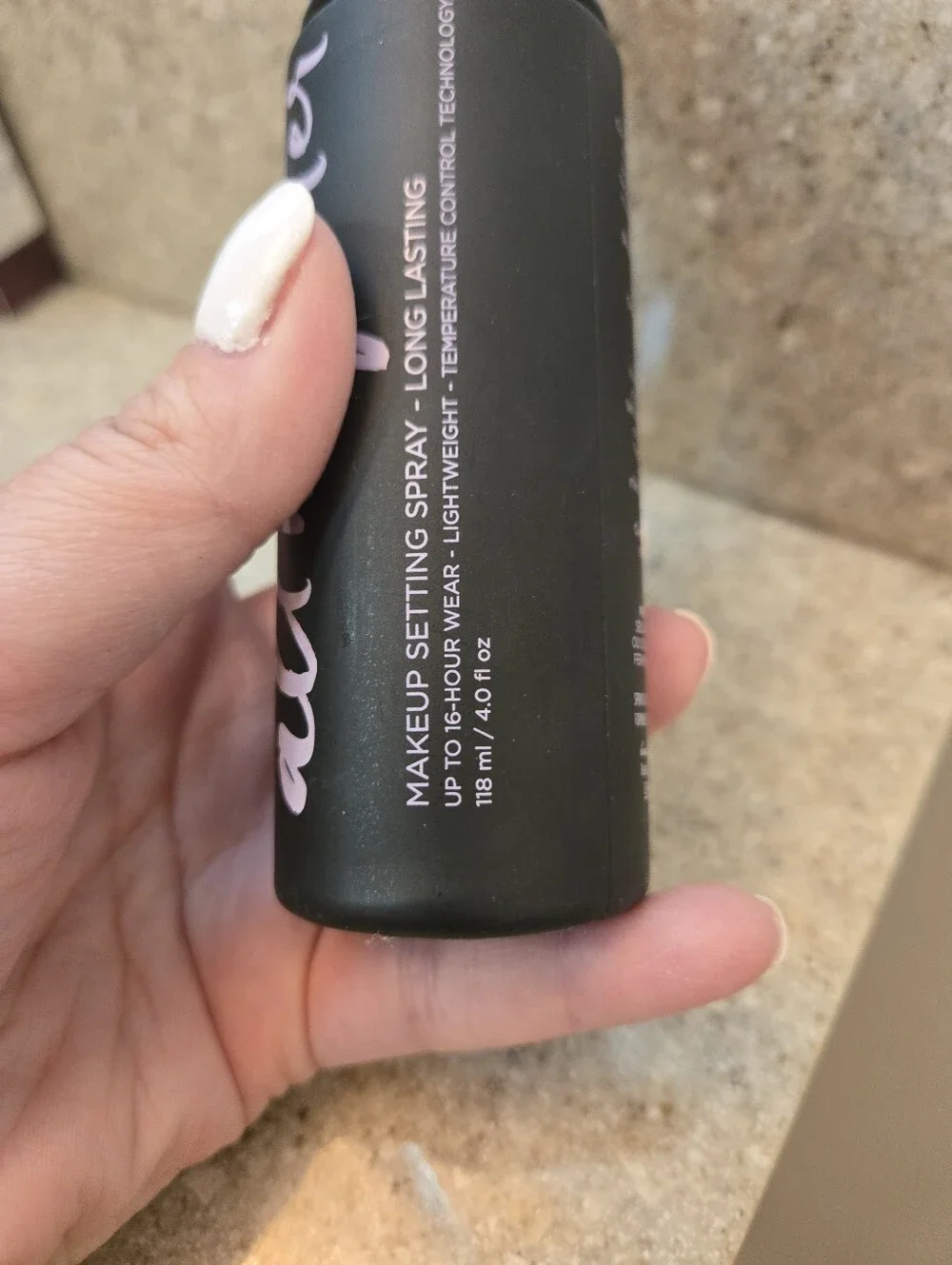 Urban Decay Setting Spray Bottle in Black with Purple Cap